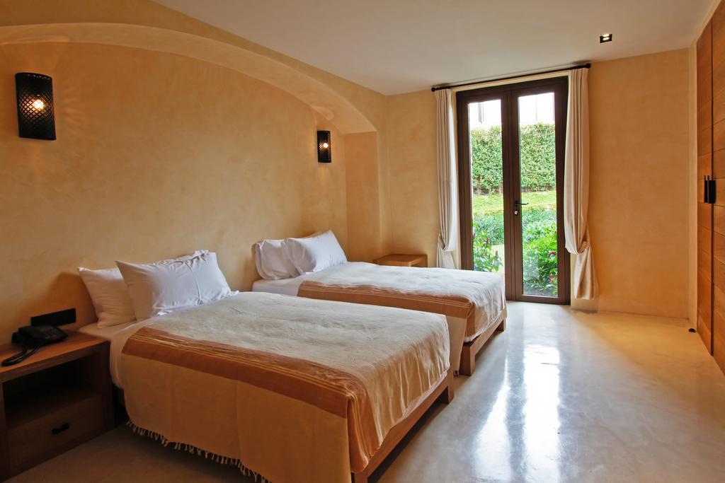 Toscana Town Square Suites Mu Si Room photo